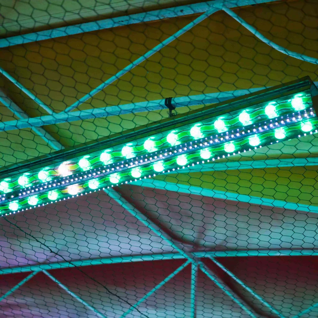 funfair-top-night-with-green-blue-lights